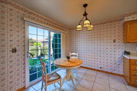 a bathroom with a toilet and a window