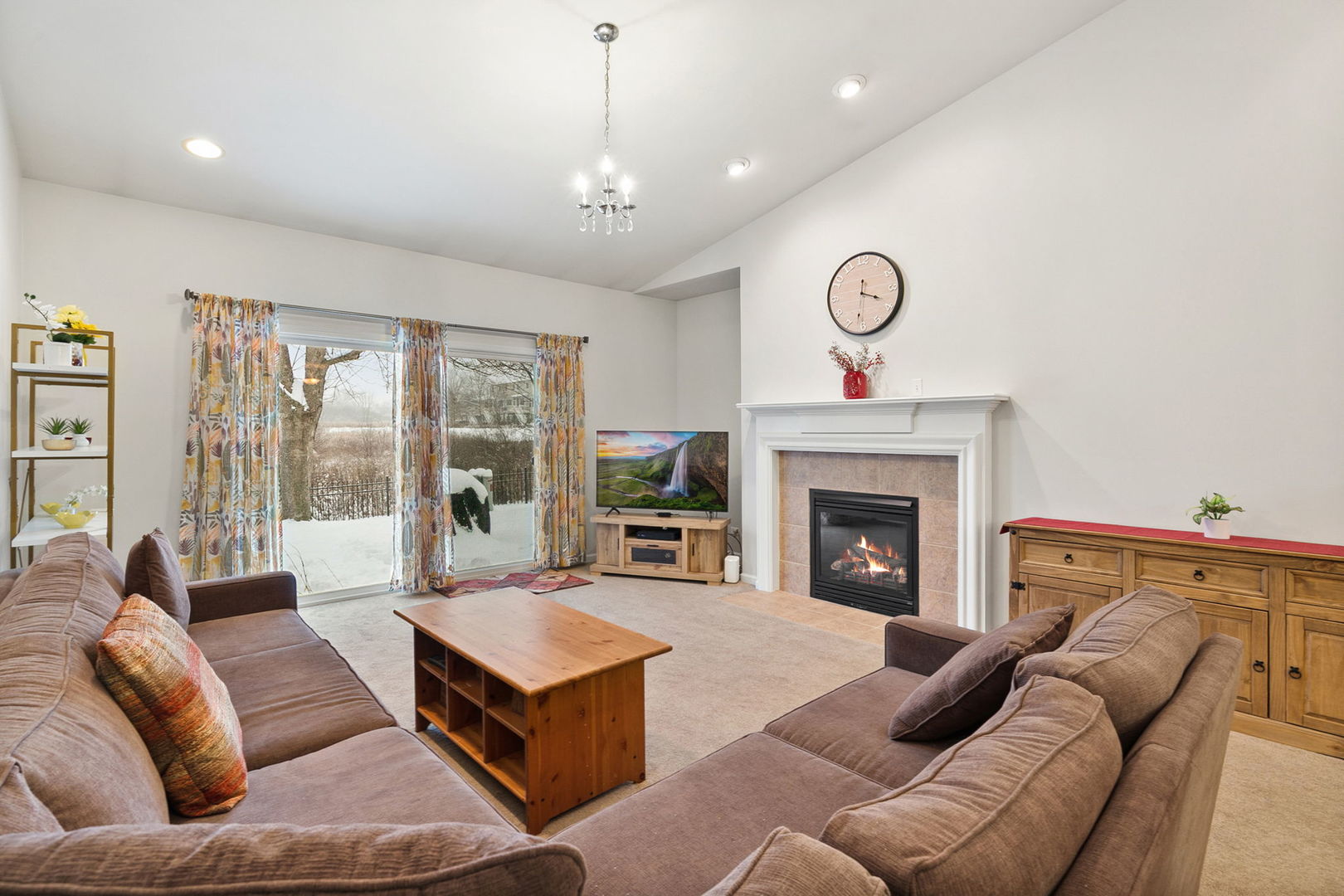 2854 Waterfront Avenue Algonquin, IL 60102 - Photo 2 of 29 a living room with furniture and a fireplace