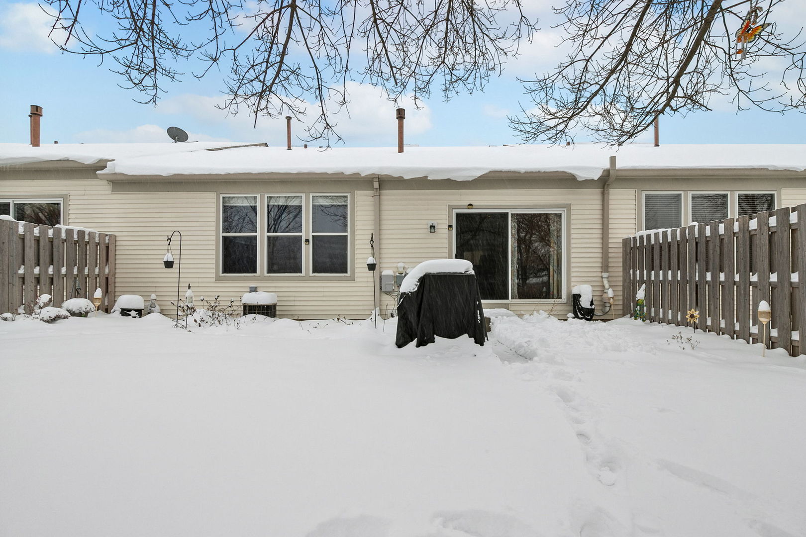 2854 Waterfront Avenue Algonquin, IL 60102 - Photo 26 of 29 a view of a house with a yard covered in snow
