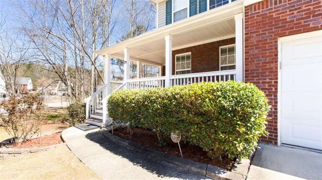 3721 Bogan Mill Road Northeast Buford, GA 30519 - Photo 5 of 58 a view of a house with a yard