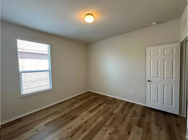 a view of kitchen with furniture and window