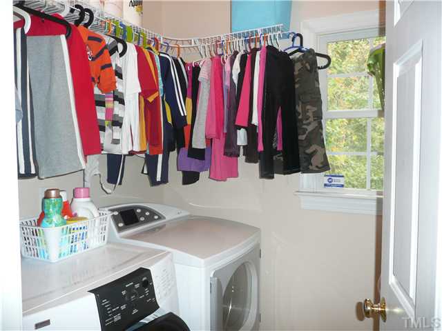 3200 Tabor Court Raleigh, NC 27604 - Photo 19 of 25 Nice size of the laundry room with the window.