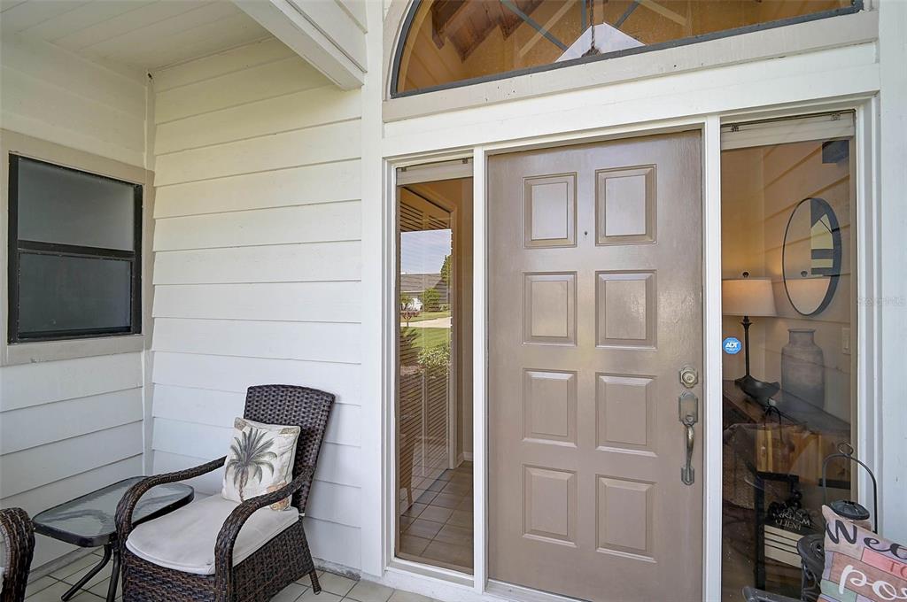 4312 Pro Am Avenue East Bradenton, FL 34203 - Photo 5 of 37 a view of a door and chair in the balcony