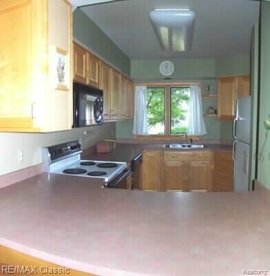 3012 Rivers Edge Drive Wayne, MI 48184 - Photo 8 of 18 Kitchen w/ natural wood cabinets