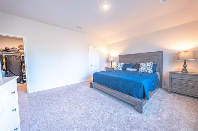 a bathroom with a sink toilet and a mirror