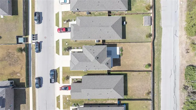 an aerial view of residential houses with outdoor