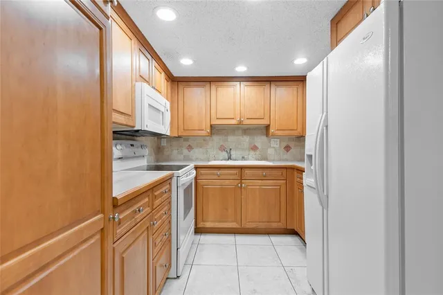 $185,000 | 11101 Royal Palm Boulevard, Unit 102, Coral Springs, FL 33065