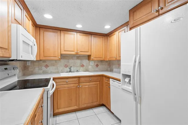 $185,000 | 11101 Royal Palm Boulevard, Unit 102, Coral Springs, FL 33065