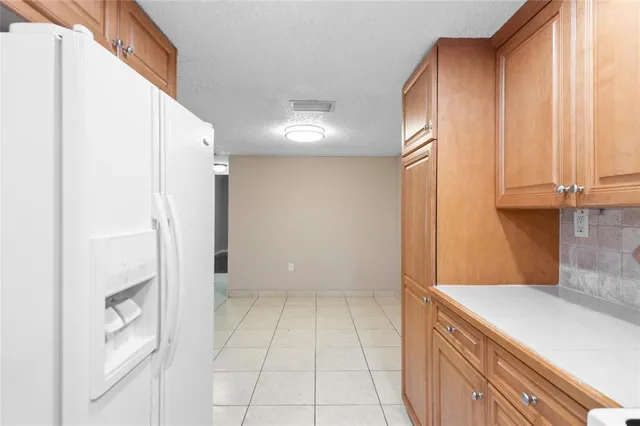$185,000 | 11101 Royal Palm Boulevard, Unit 102, Coral Springs, FL 33065