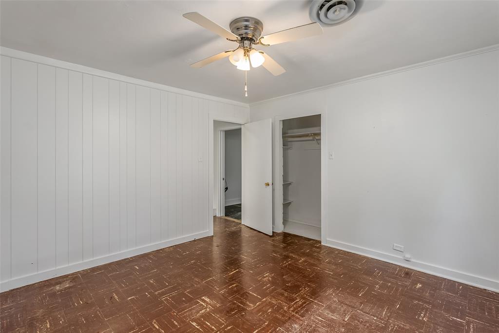 9008 Hosston Vivian Road Vivian, LA 71082 - Photo 20 of 30 a view of a room with a chandelier fan and a window