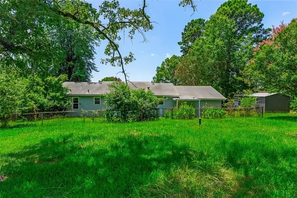 a view of a backyard with a garden
