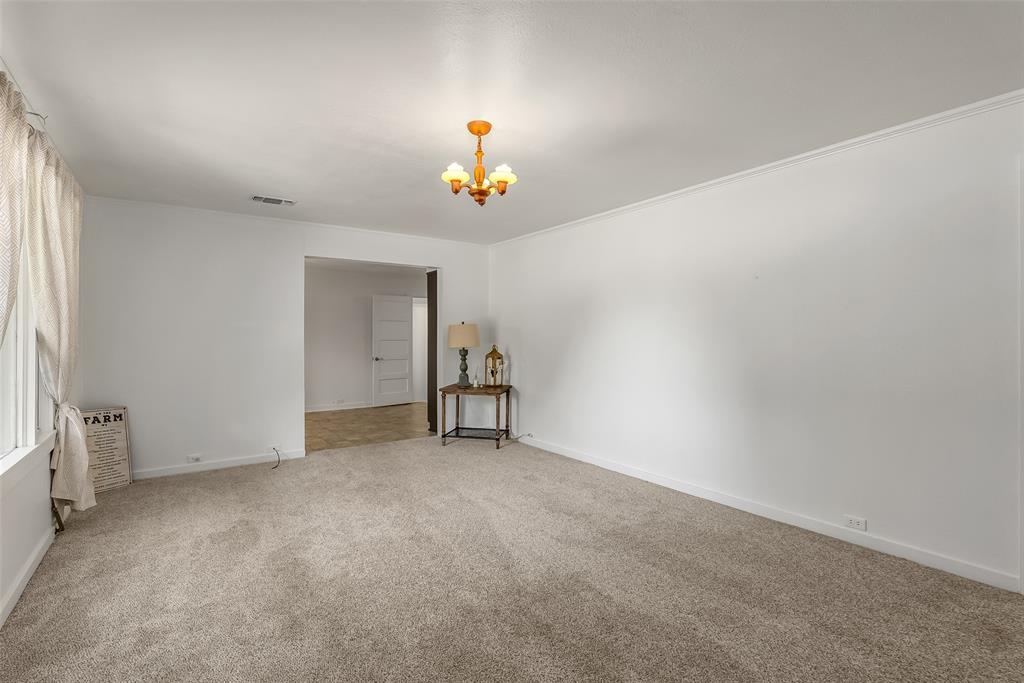 9008 Hosston Vivian Road Vivian, LA 71082 - Photo 4 of 30 a view of an empty room with a window