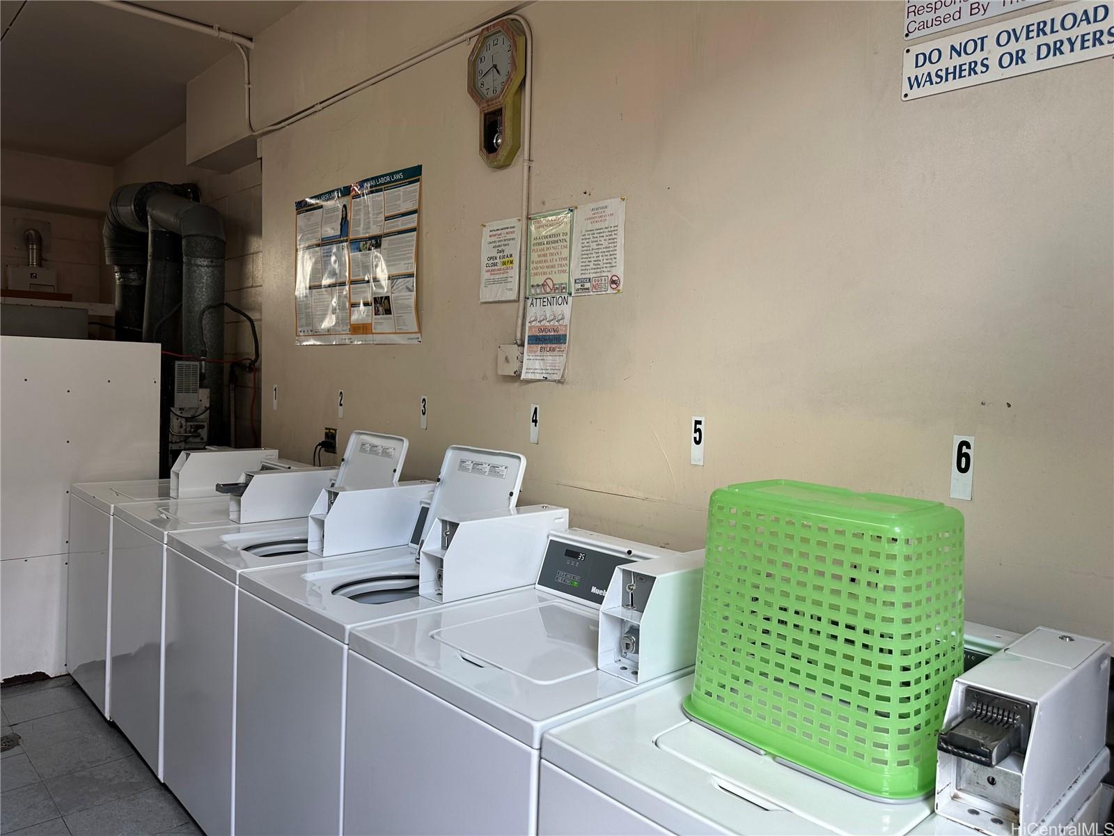 1325 North School Street, Unit C323 Honolulu, HI 96817 - Photo 11 of 11 a bathroom with a sink mirror and toilet