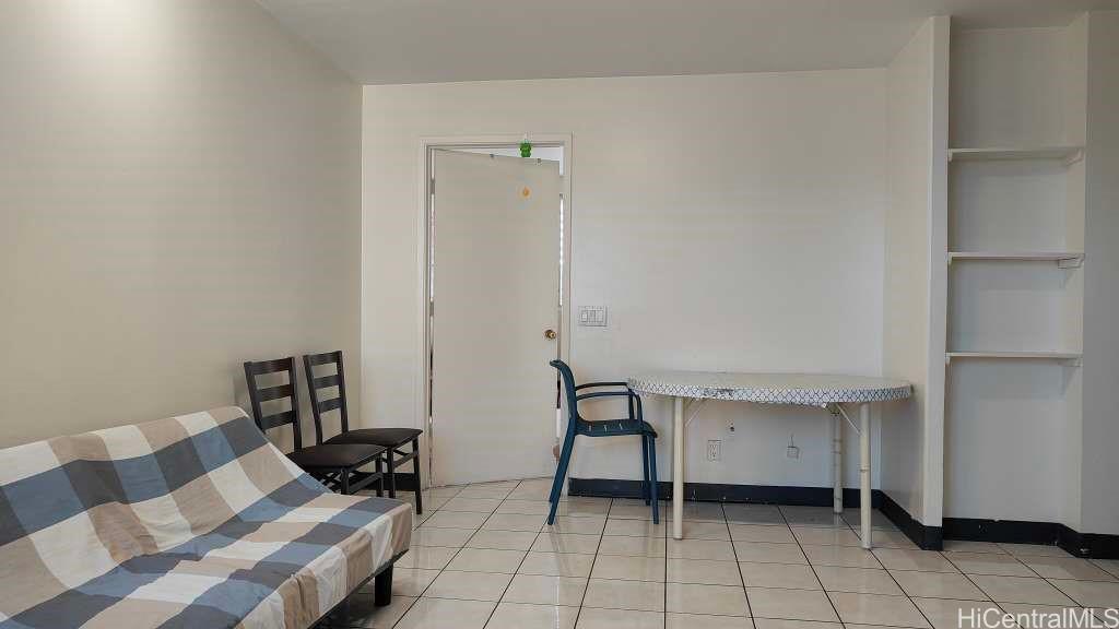 1325 North School Street, Unit C323 Honolulu, HI 96817 - Photo 3 of 11 a view of room with furniture and wooden floor