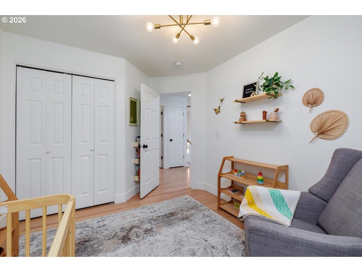 36745 Eldridge Drive Sandy, OR 97055 - Photo 20 of 39 a living room with furniture and wooden floor