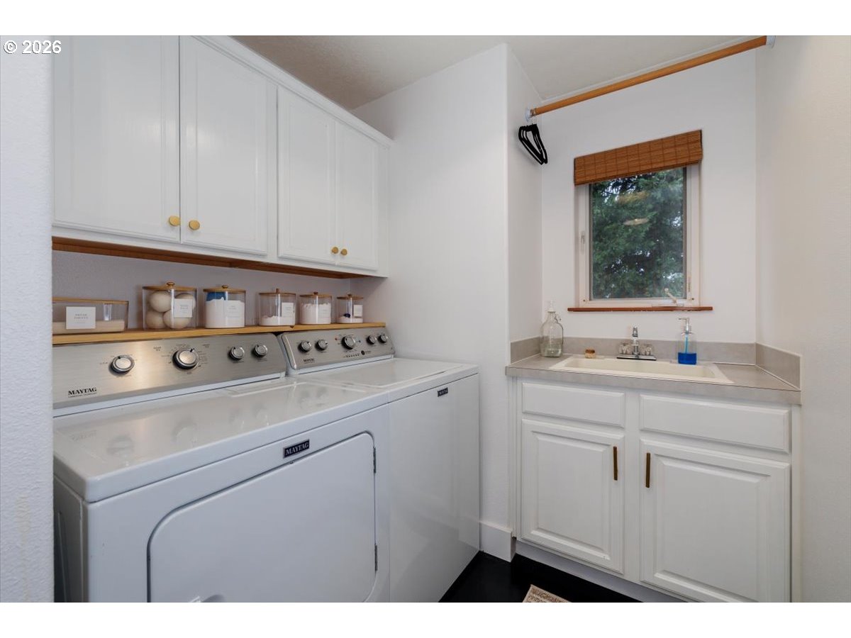 36745 Eldridge Drive Sandy, OR 97055 - Photo 24 of 39 a kitchen with a sink cabinets and a window
