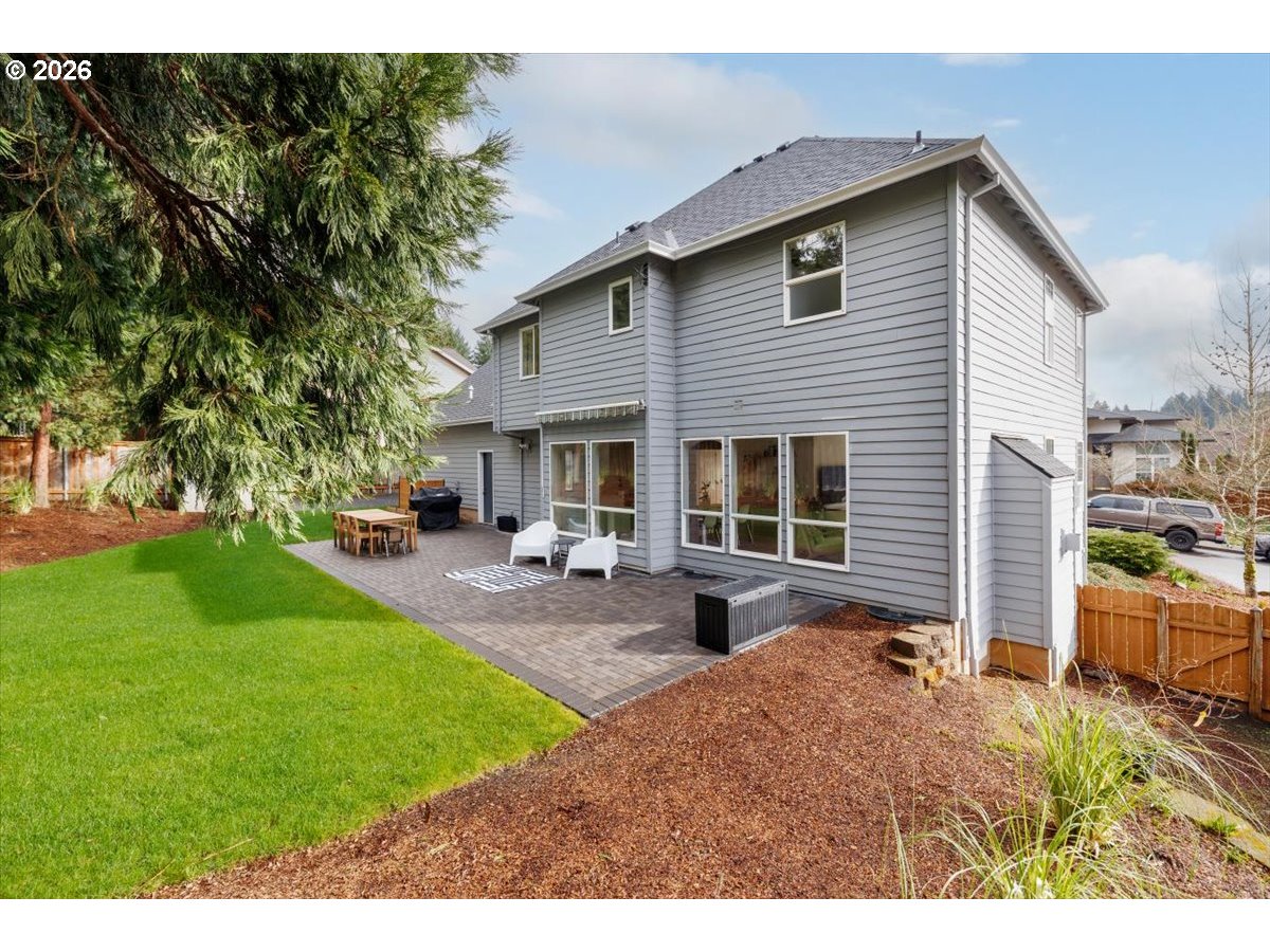 36745 Eldridge Drive Sandy, OR 97055 - Photo 36 of 39 a view of a house with sitting area and garden