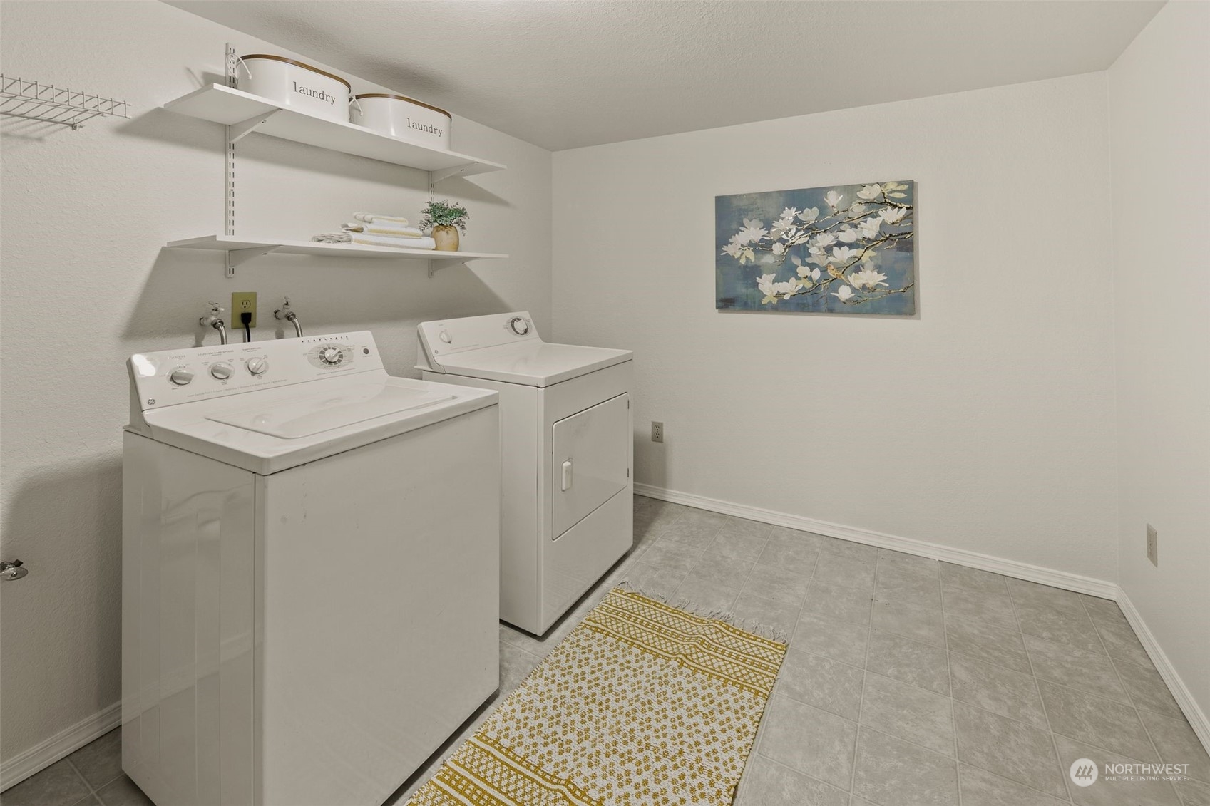 1633 Eagle Ridge Drive South, Unit A5 Renton, WA 98055 - Photo 10 of 25 a utility room with dryer and washer