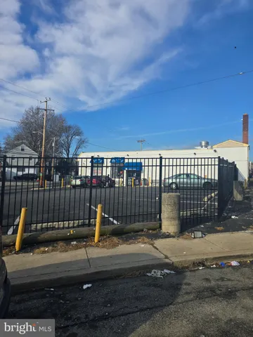 a view of a building with a street