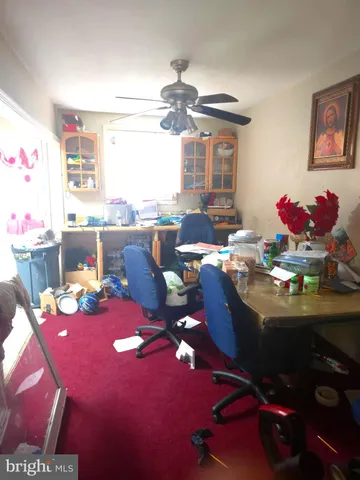 a very nice looking dining room with a table and chairs