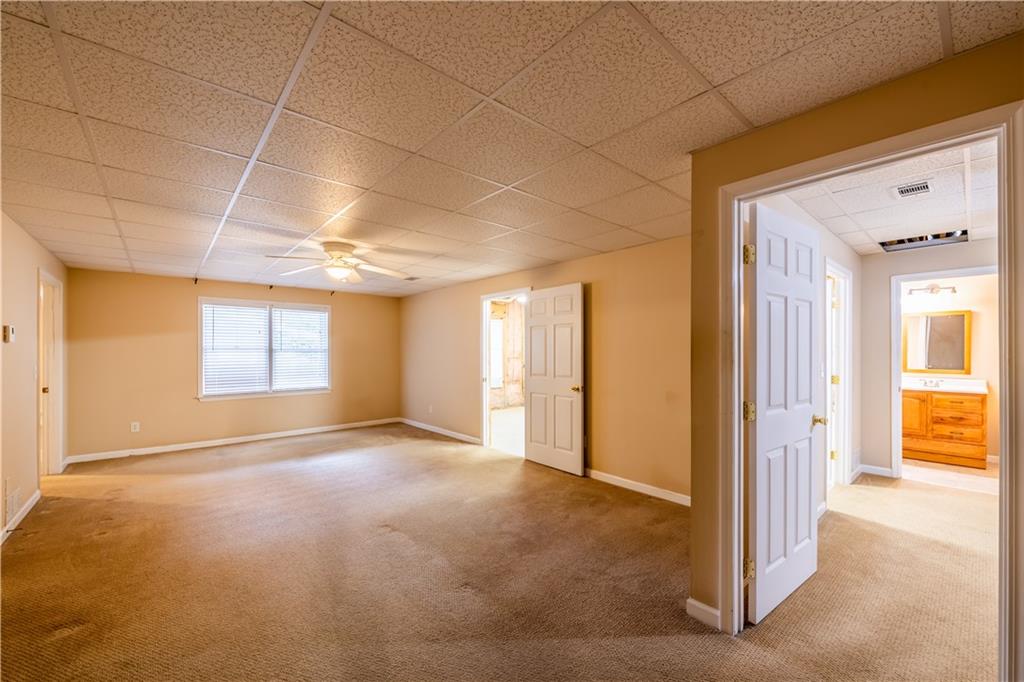 4924 Hugh Howell Road Stone Mountain, GA 30087 - Photo 29 of 42 a view of an empty room with a window
