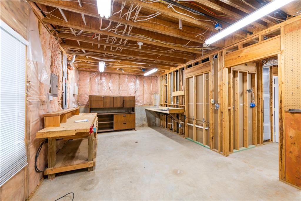4924 Hugh Howell Road Stone Mountain, GA 30087 - Photo 32 of 42 a view of a room with wooden walls