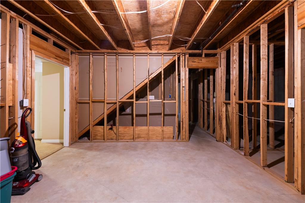 4924 Hugh Howell Road Stone Mountain, GA 30087 - Photo 34 of 42 a view of an empty room with stairs
