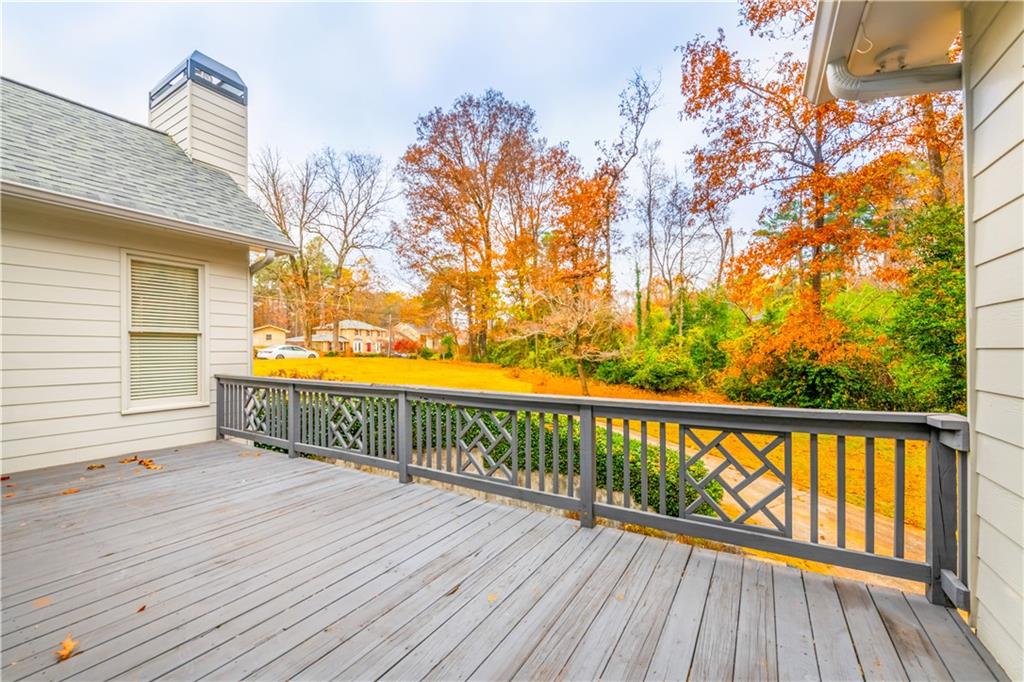 4924 Hugh Howell Road Stone Mountain, GA 30087 - Photo 36 of 42 a view of balcony with wooden floor