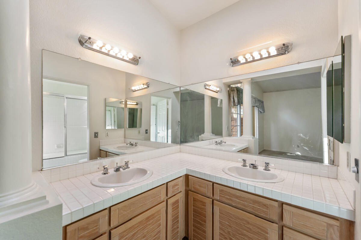 2110 Bermuda Dunes Place Oxnard, CA 93036 - Photo 21 of 43 a bathroom with a sink double vanity and a mirror
