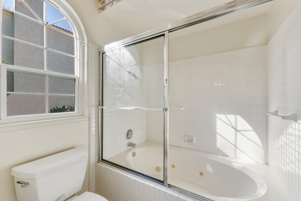 2110 Bermuda Dunes Place Oxnard, CA 93036 - Photo 24 of 43 a bathroom with a shower and a toilet