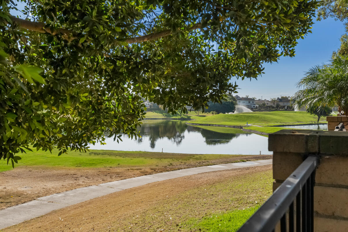 2110 Bermuda Dunes Place Oxnard, CA 93036 - Photo 32 of 43 a view of a swimming pool and a yard