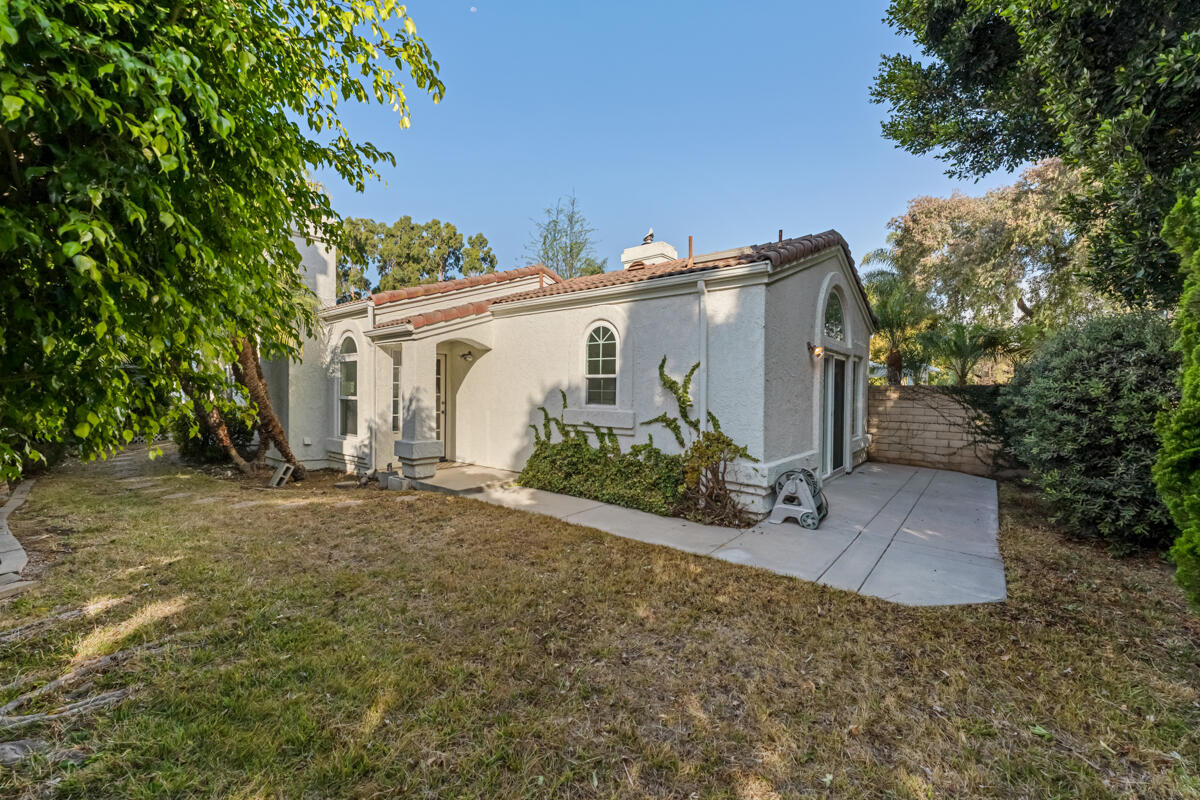 2110 Bermuda Dunes Place Oxnard, CA 93036 - Photo 37 of 43 a view of a house with potted plants and large trees