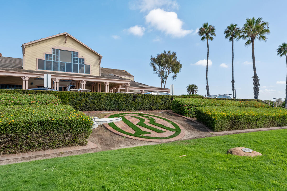 2110 Bermuda Dunes Place Oxnard, CA 93036 - Photo 40 of 43 a front view of a house with a yard table and chairs
