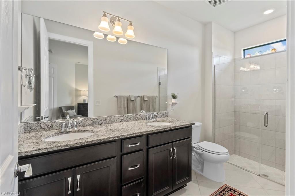 5888 Mayflower Way Immokalee, FL 34142 - Photo 15 of 44 Primary Suite Bathroom