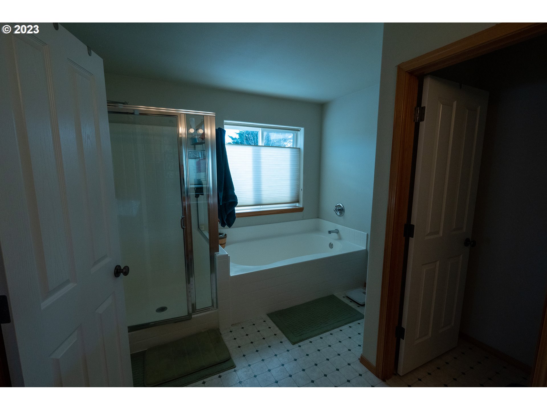23891 Southwest Middleton Road Sherwood, OR 97140 - Photo 15 of 31 a bathroom with a bathtub and a shower