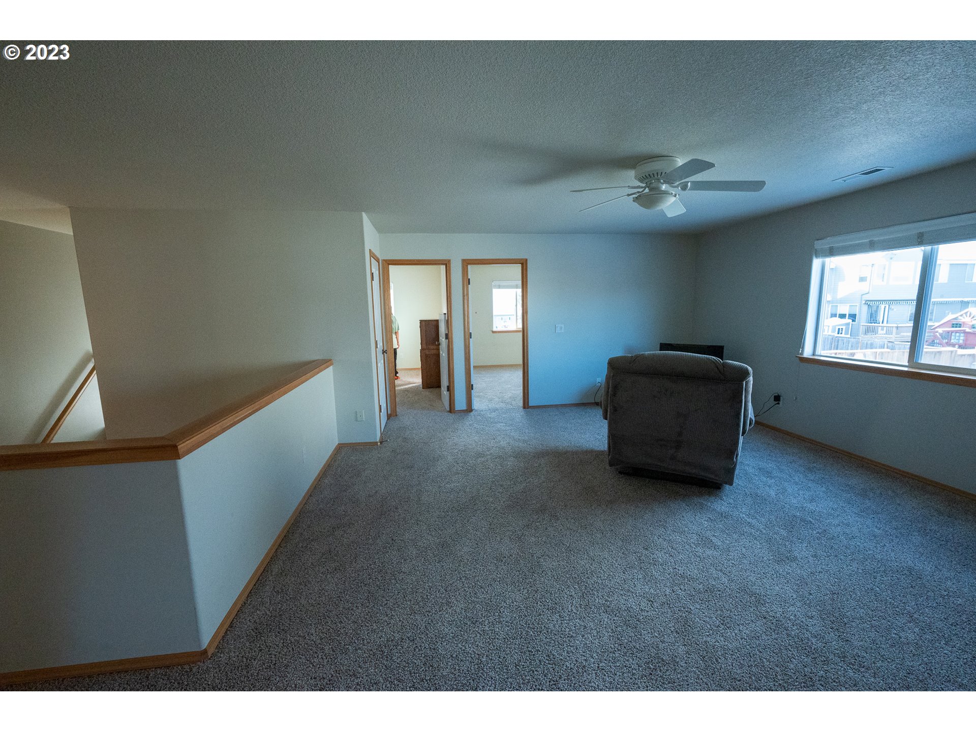 23891 Southwest Middleton Road Sherwood, OR 97140 - Photo 18 of 31 a view of an empty room with a window