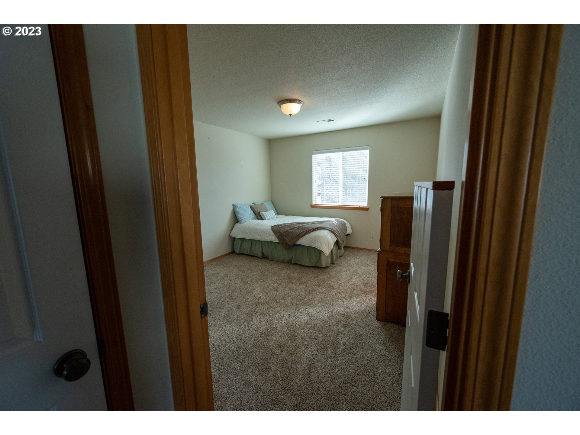 23891 Southwest Middleton Road Sherwood, OR 97140 - Photo 21 of 31 a living room with furniture and a window