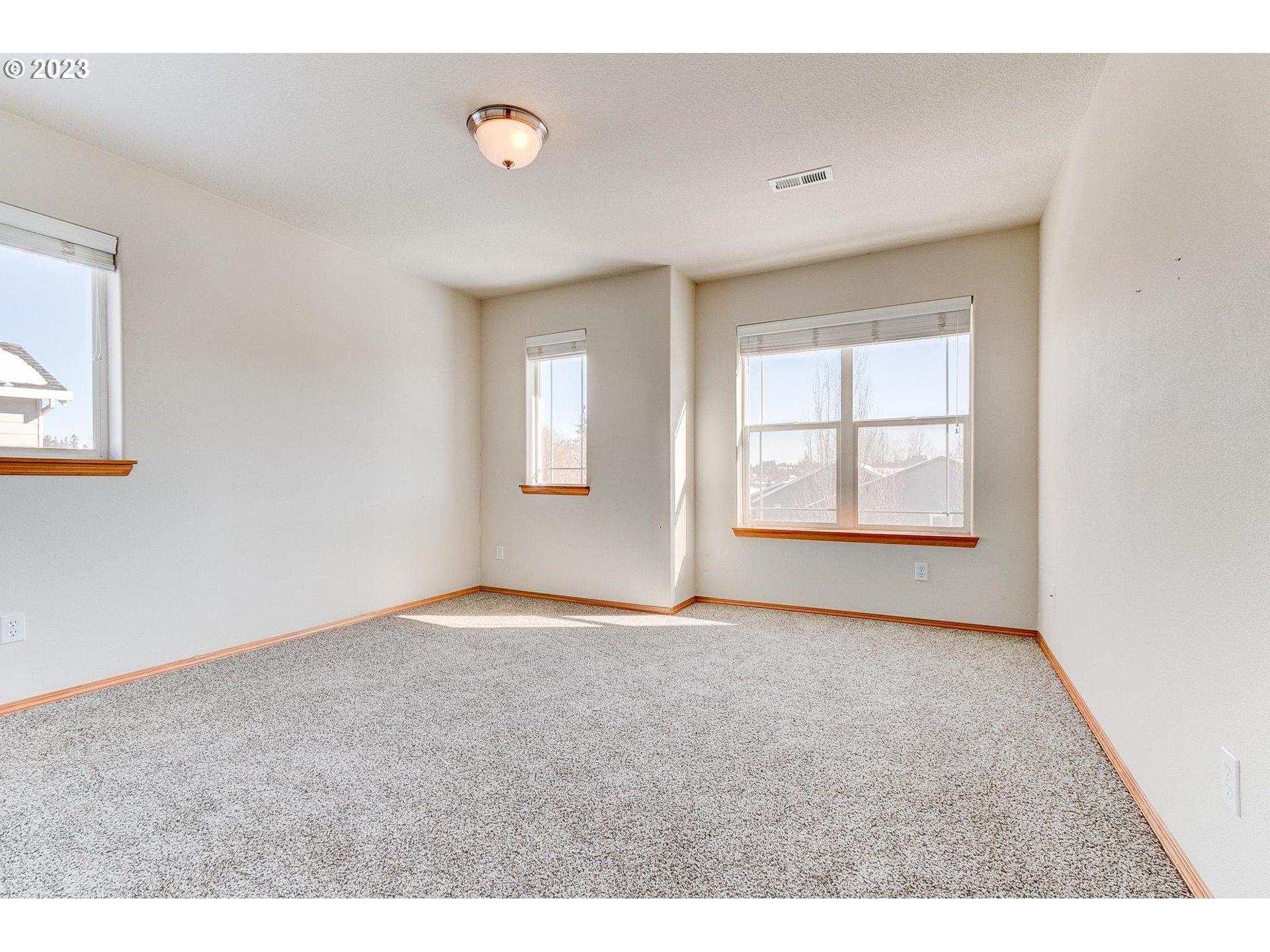 23891 Southwest Middleton Road Sherwood, OR 97140 - Photo 26 of 31 an empty room with windows