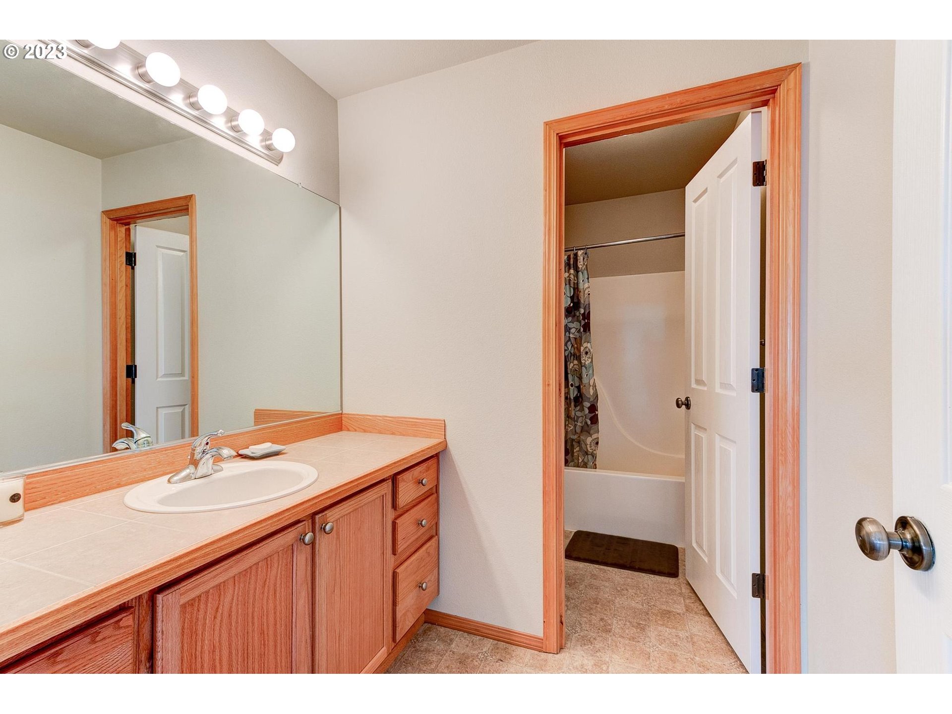 23891 Southwest Middleton Road Sherwood, OR 97140 - Photo 27 of 31 a bathroom with a sink and a mirror