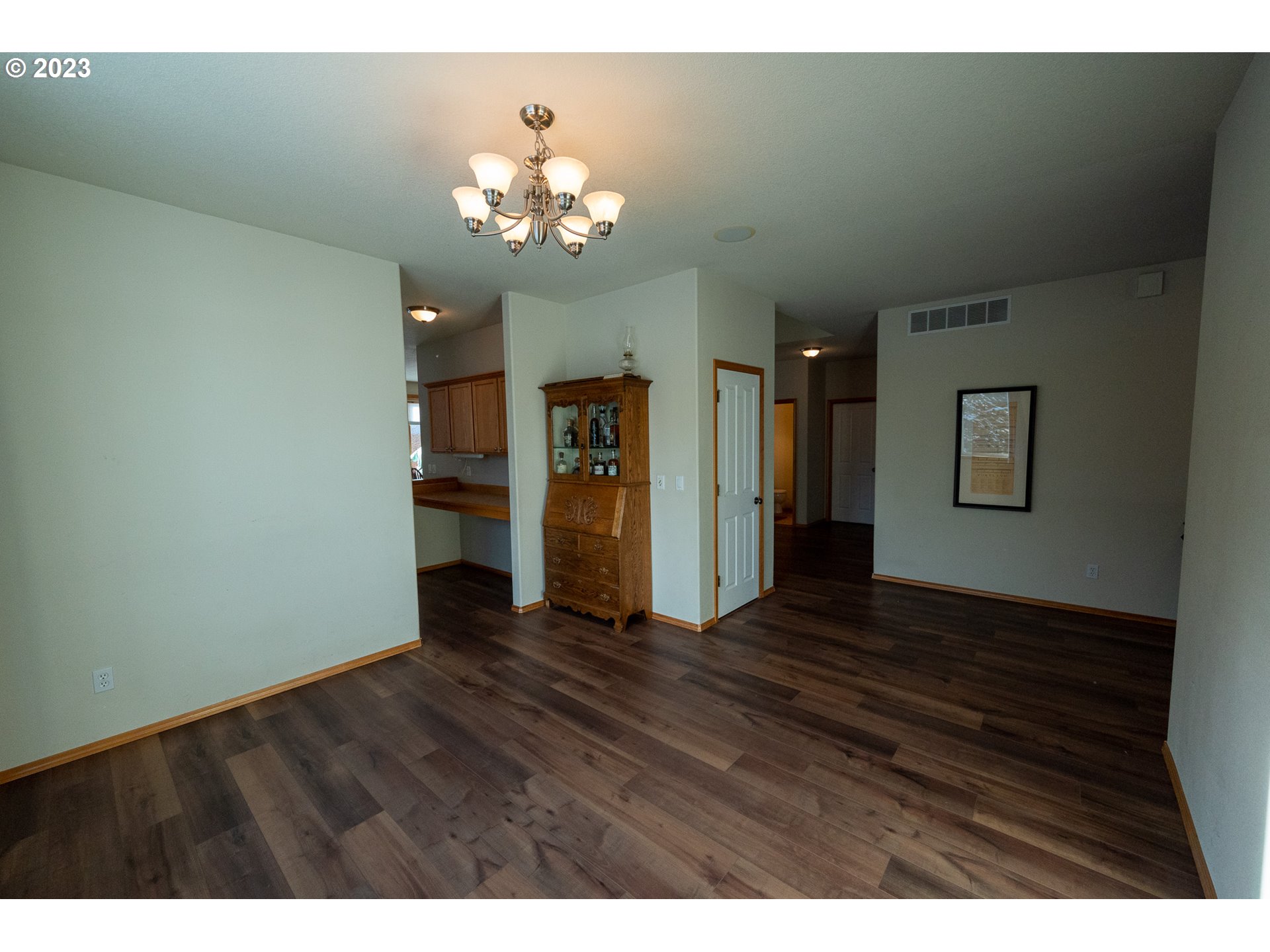 23891 Southwest Middleton Road Sherwood, OR 97140 - Photo 6 of 31 a view of an empty room with wooden floor
