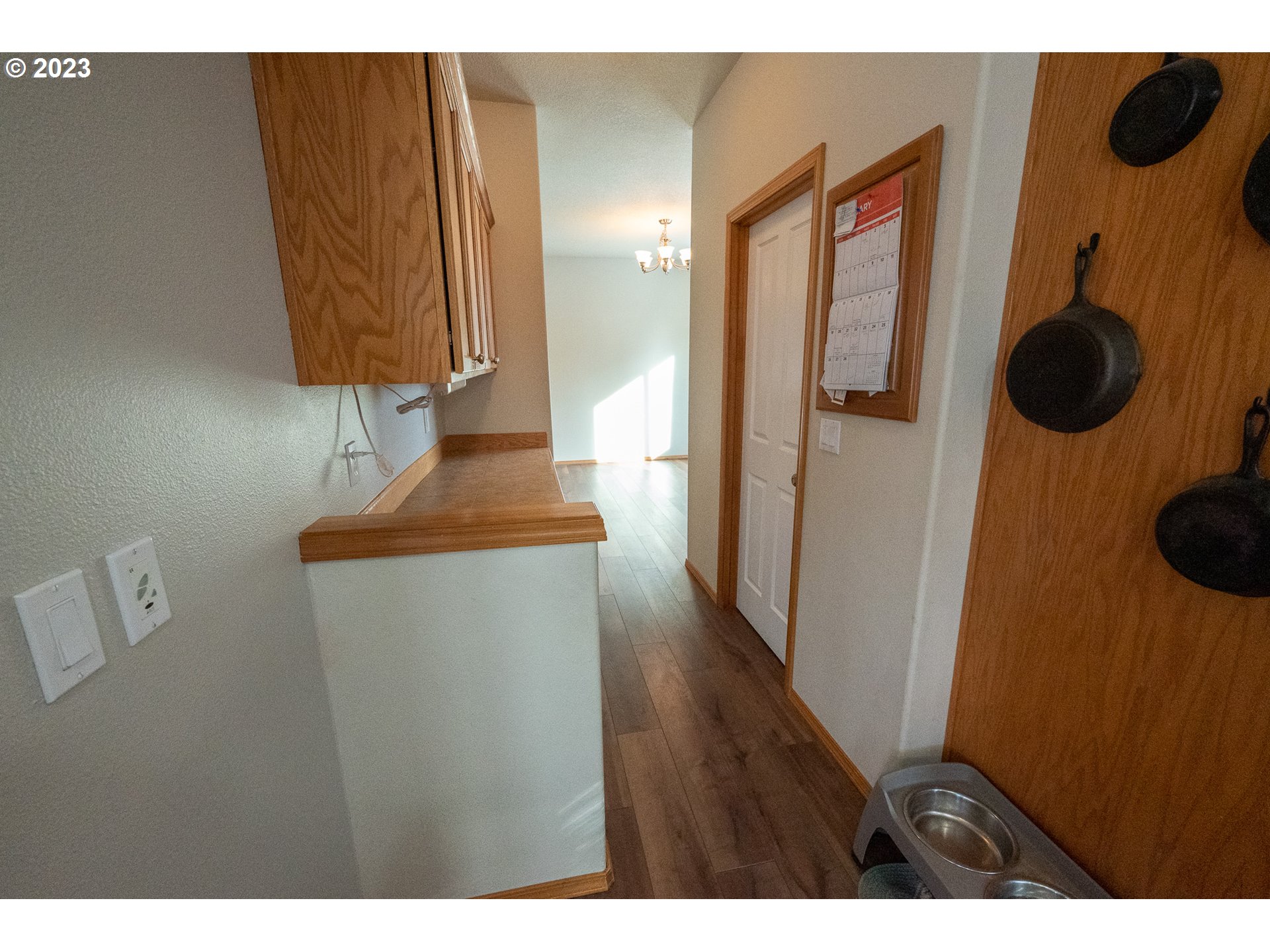 23891 Southwest Middleton Road Sherwood, OR 97140 - Photo 10 of 31 a view of a hallway with wooden floor