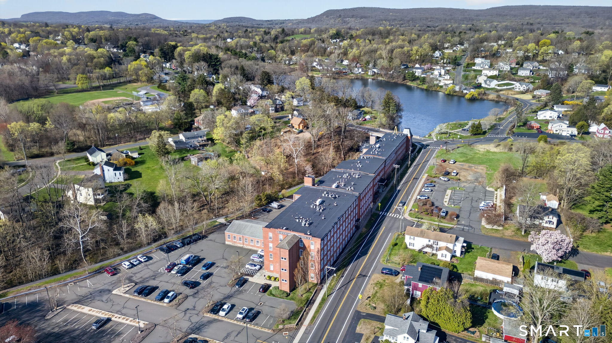 10 Main Street, Unit 102 Berlin, CT 06037 - Photo 26 of 28 an aerial view of multiple house