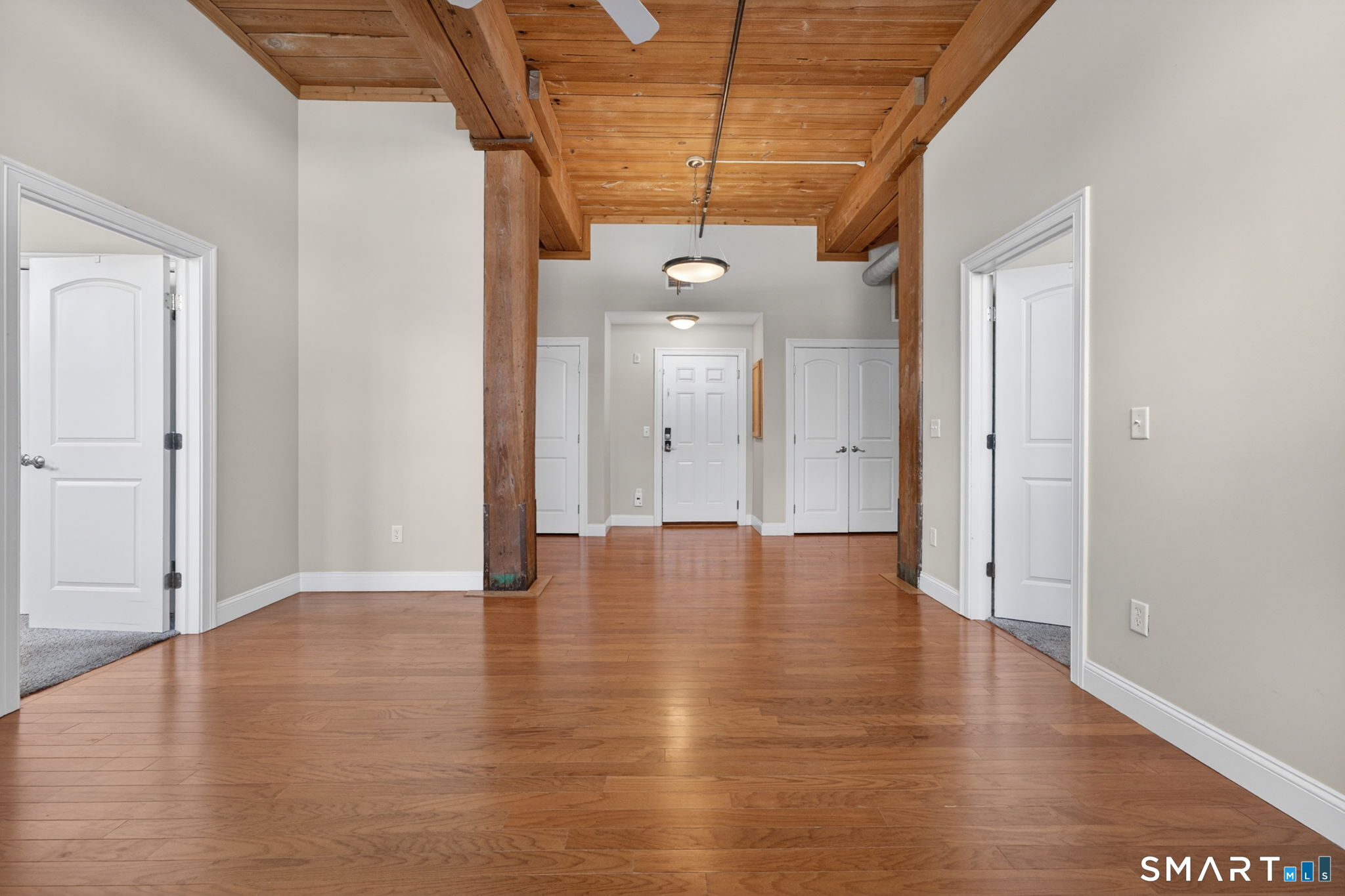 10 Main Street, Unit 102 Berlin, CT 06037 - Photo 9 of 28 a view of a room with wooden floor