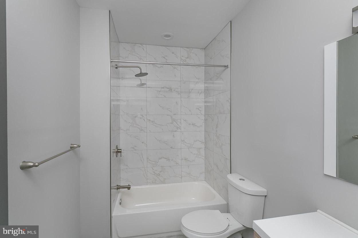 3601 Chapman Road Randallstown, MD 21133 - Photo 21 of 30 a bathroom with a toilet and shower