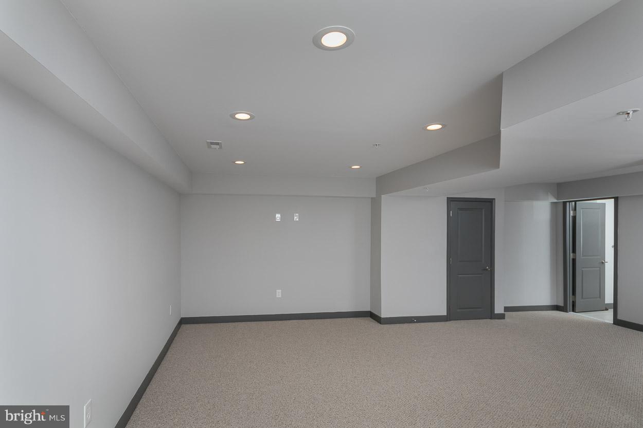 3601 Chapman Road Randallstown, MD 21133 - Photo 26 of 30 an empty room with closet and natural light