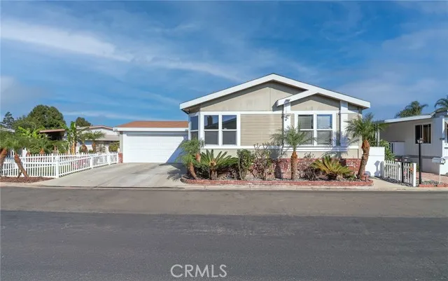 a view of a house and a yard