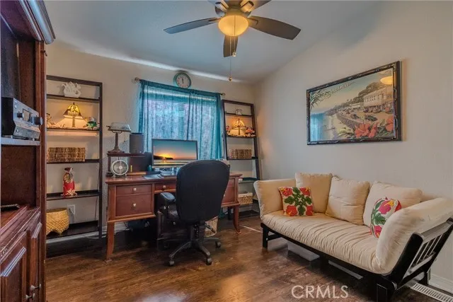 10550 Western, Unit 93 Stanton, CA 90680 - Photo 14 of 34 a view of a livingroom with workspace and a couch