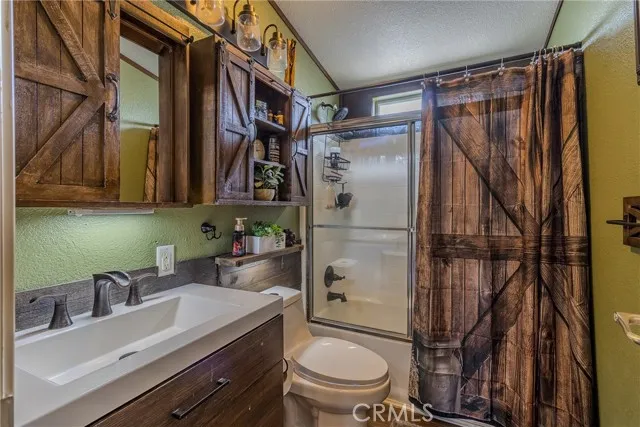 10550 Western, Unit 93 Stanton, CA 90680 - Photo 17 of 34 a bathroom with a sink toilet and shower