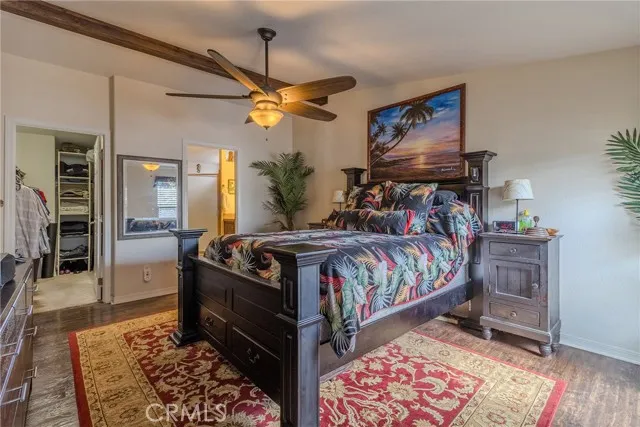 10550 Western, Unit 93 Stanton, CA 90680 - Photo 20 of 34 a bedroom with furniture and a chandelier