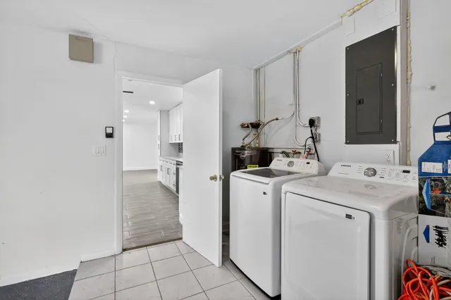 a view of empty room with stairs